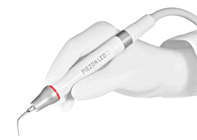 PIEZON with Hand PIEZON LED Ultraschallhandstück in Hand mit Handschuh
